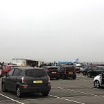 There's a whole parkinglot full of people watching planes