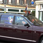 The queen driving my in her car. She looked the other way :(